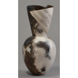 KARIN HESSENBURG (born 1944); a smoke fired raku vase, cut and flared neck, variegated burnished
