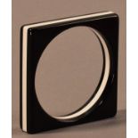 WENDY MASON; an acrylic bangle of square form in black and white, inner diameter 6.5cm.

Provenance: