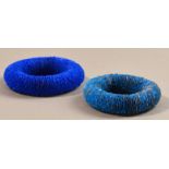 RACHEL DARBOURNE; two polythene bangles made from recycled carrier bags, bright blue and blue/