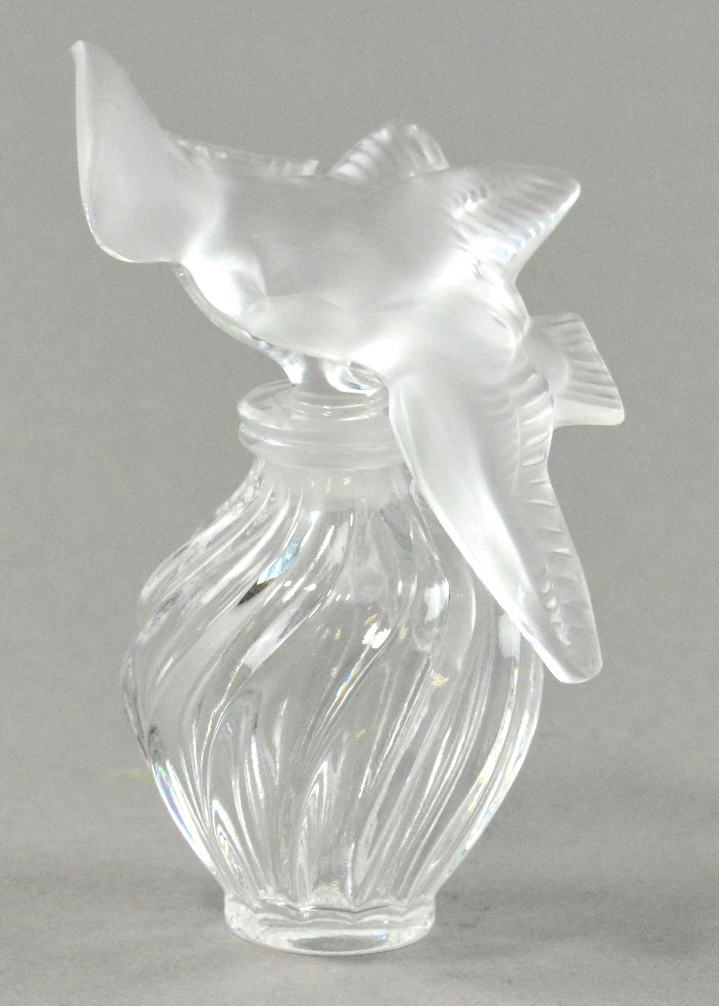 A Lalique glass scent bottle with stopper in the form of a pair of doves, incised signature,