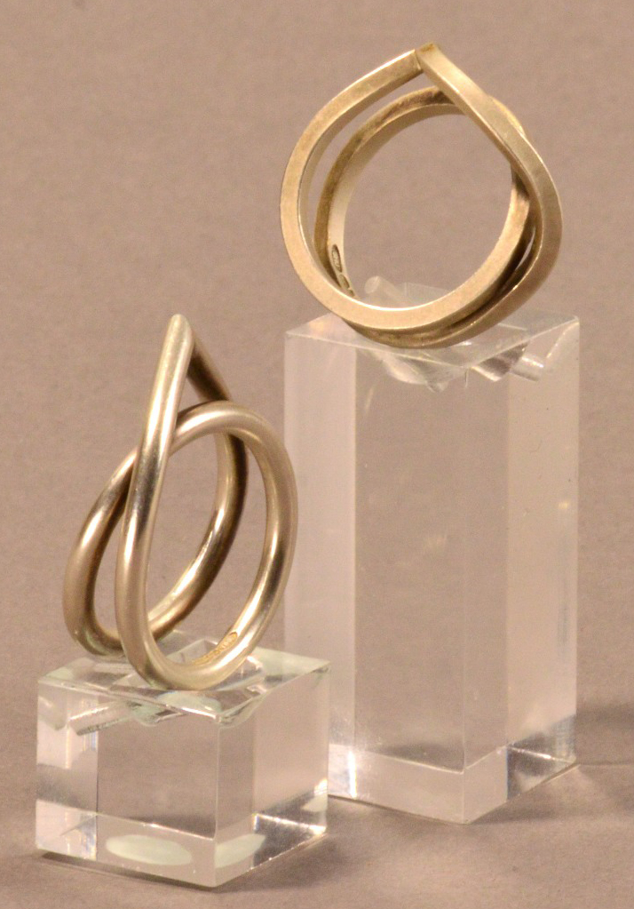 DONG-HYUN KIM; two hallmarked silver rings, ring size P and R (2).

Provenance: Purchased from