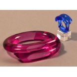MARLENE McKIBBIN (born 1953); a pink acrylic faceted bangle, inner diameter 7cm; with a blue acrylic