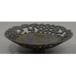 IAN GODFREY (1942-1992); a pierced stoneware footed dish, bronze glaze, incised floral decoration,