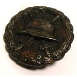 A German WWI wound badge.
