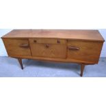 A retro pale oak long sideboard on splayed legs,