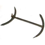 A "Crewsaver" bronze four prong anchor with central sliding bar, stamped, length 33cm.
