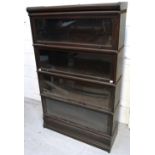 A Globe Wernicke style four section glazed stacking bookcase, width 86cm (af).