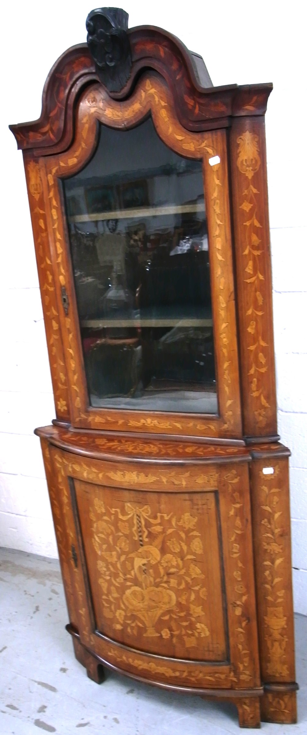 A 19th century Dutch walnut and floral marquetry inlaid display cabinet,