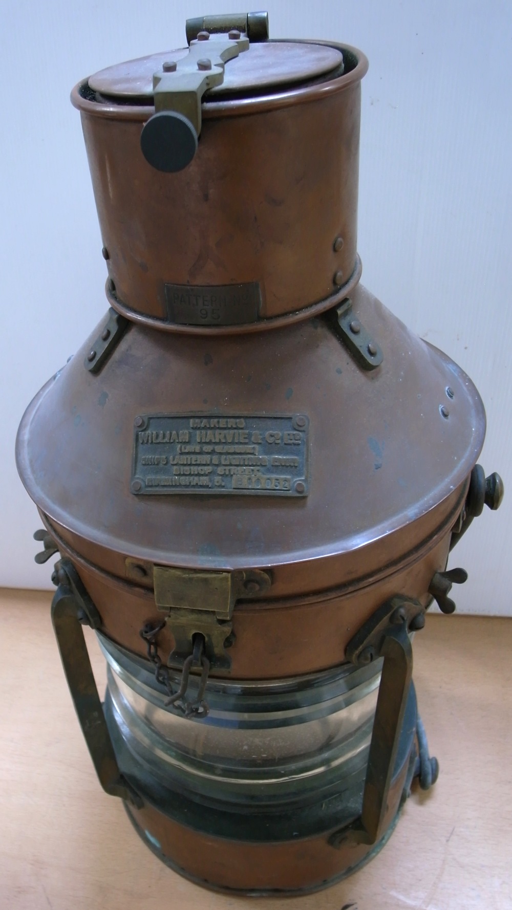 A large copper ship's "At anchor" or "Not under command" lamp,