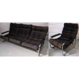 A 1960s chrome framed three seater sofa and one matching chair (2).