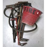 Four WWII stirrup pumps and a fire bucket (5).