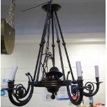 A patinated metal five branch electrolier, formerly from the Port of Liverpool building,