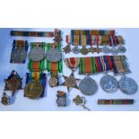 A group of medals belonging to the same family to include two WWI defence medals for two sisters