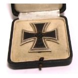 A cased German WWII first class Iron Cross with brooch fitting.
