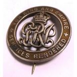 A WWI silver War Services badge awarded to; David Brown 37212, Royal Scots.