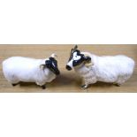 A pair of non matching Beswick rams.