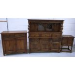 A 20th century oak court cupboard, carved top above central twin astragal glazed doors,