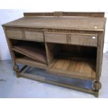 A vintage pine sideboard on block supports with stretchers, width 135cm (af).