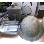 A mid 20th century British Infantryman's helmet complete with liner,