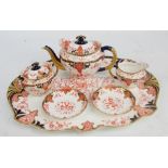 A Royal Crown Derby teapot, matching sucrier and cover, jug, two saucers and large tea tray, width