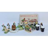 A boxed Carlton Ware Guinness advertising figure of a drayman, and various reproduction Guinness