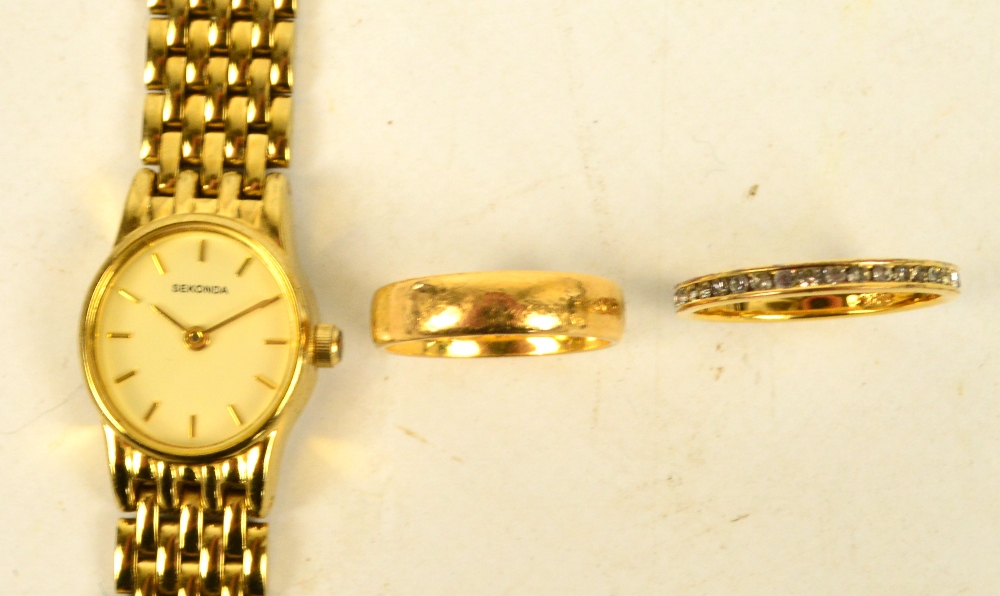 SEKONDA; a gold plated manual wind lady's wristwatch, the oval dial set with baton numerals,