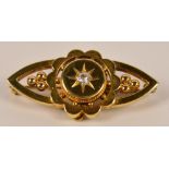 A 15ct yellow gold and diamond lozenge shaped brooch, the central stone approx 0.20cts within