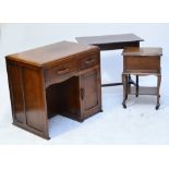 A 1940s single oak pedestal desk, an oak occasional table, and a sewing box (3).