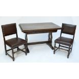 An oak drawleaf dining table and six chairs (7).