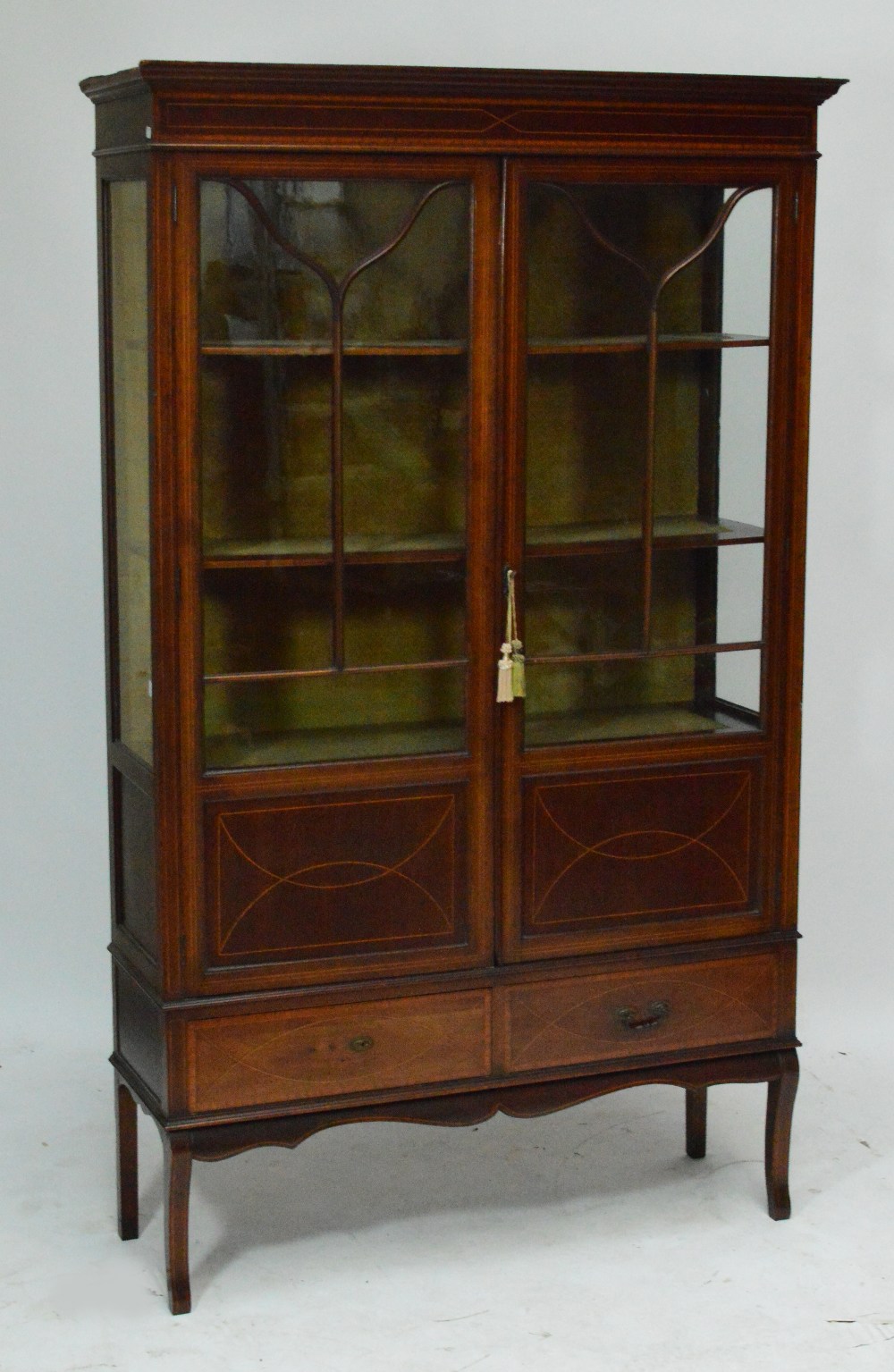 An Edwardian mahogany and inlaid display cabinet,