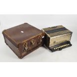 An early 20th century Hohner, cased. CONDITION REPORT: Heavy wear to wood but all buttons present