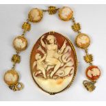 An 18ct yellow gold framed oval cameo brooch depicting Cupid and Psyche, 5 x 4cm,