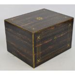 A Victorian coromandel, brass bound and inlaid vanity box, the hinged lid with Bramah lock enclosing