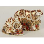 Two Royal Crown Derby paperweights; Bengal tiger and Bengal tiger cup, both with gold plugs,