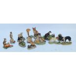 A collection of thirteen Border Fine Arts figures and figure groups, to include fox and hedgehog,