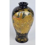A Japanese Meiji period Satsuma vase of baluster form painted in enamels with two opposing panels