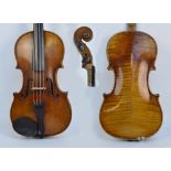 A full size German Stradivarius copy violin with two-piece back, length 35.7cm. CONDITION REPORT: