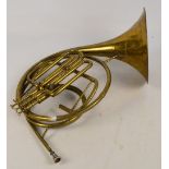 A brass French horn.