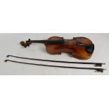 A full size violin, for restoration, cased with two bows.