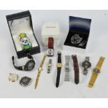 A quantity of fashion watches including boxed Klaus-Kobec wristwatch,