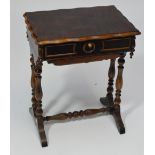 A 20th century Continental walnut sewing table, the shaped hinged lid above basket,