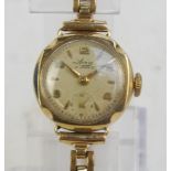 AVIA; a lady's 9ct gold cased wristwatch, the circular dial set with subsidiary seconds.