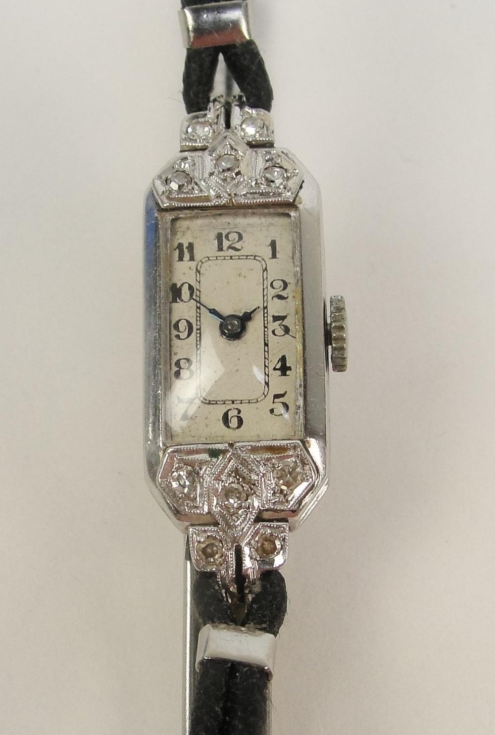 A lady's Art Deco platinum diamond set cocktail watch,