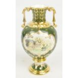 A Royal Crown Derby limited edition vase "Tatton Park" with gilt heightening on a dark green ground,