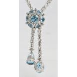 ORIDIAM; an 18ct white gold rope link chain and blue topaz tie necklace,