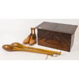 An early 20th century cantilevered oak sewing box, width 40cm when closed, 90.