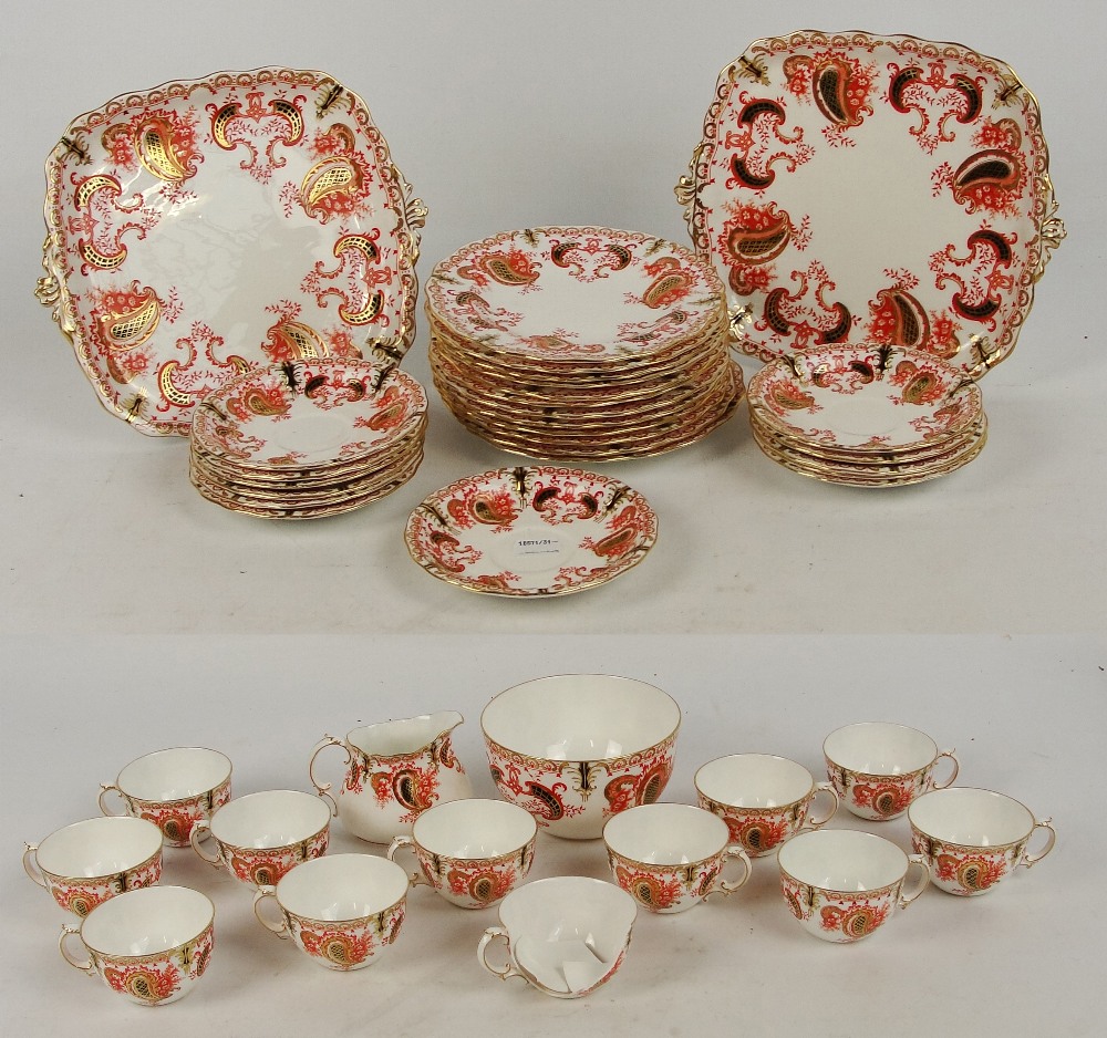An early Royal Crown Derby floral decorated tea service comprising twelve cups, twelve saucers,