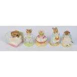 Five Royal Beatrix Potter figures; "Peter in Bed", "Tom Kitten", "Mrs Rabbit Cooking", "The Old