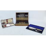 A cased set of six electroplated bladed and ivorine handled fish forks and knives with a matching