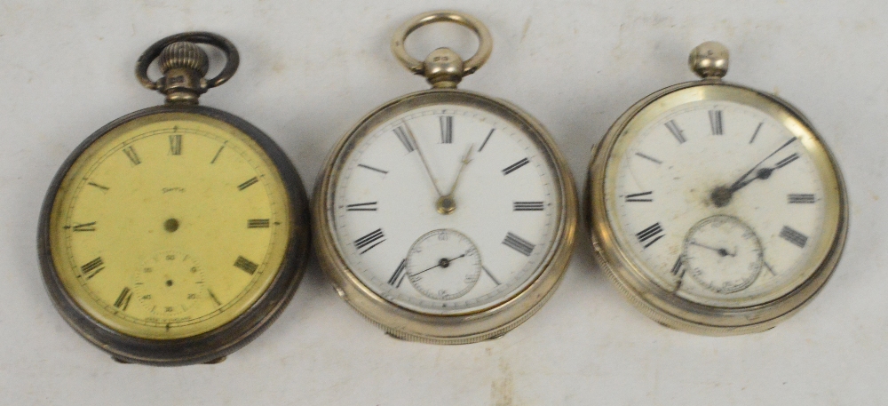 A hallmarked silver key wind open face pocket watch, the white enamel dial set with Roman numerals,